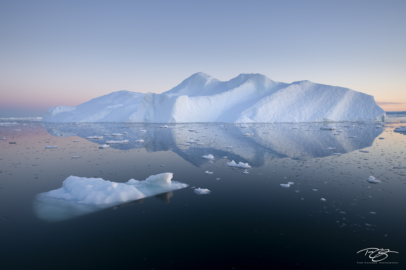 Deliquesce Icebergs in the Kangia Icefjord of Greenland slowly deliquesce into the waters of Disko Bay