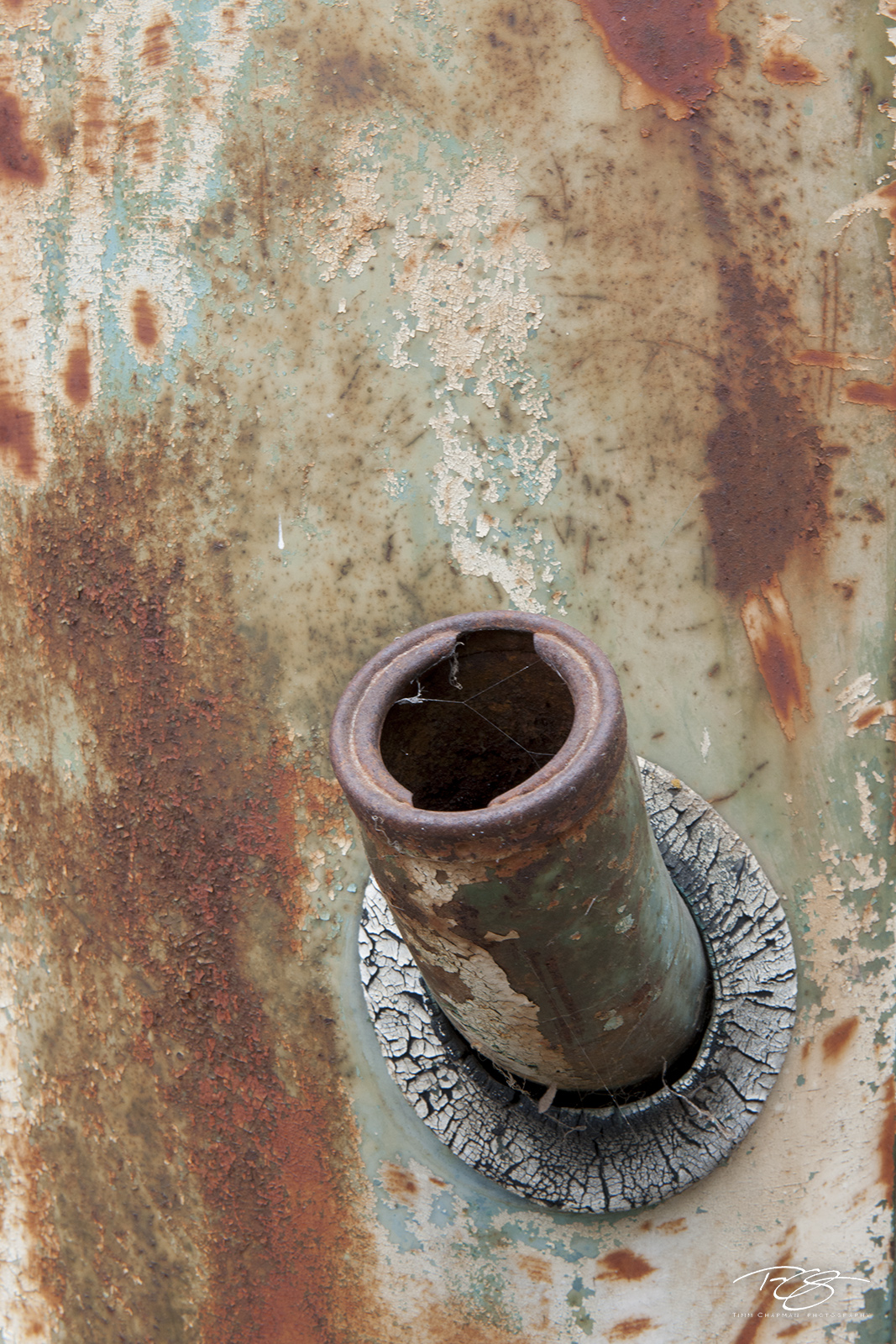 Filler Up The fuel nozzle on an old ford pickup truck wears the patina of its years