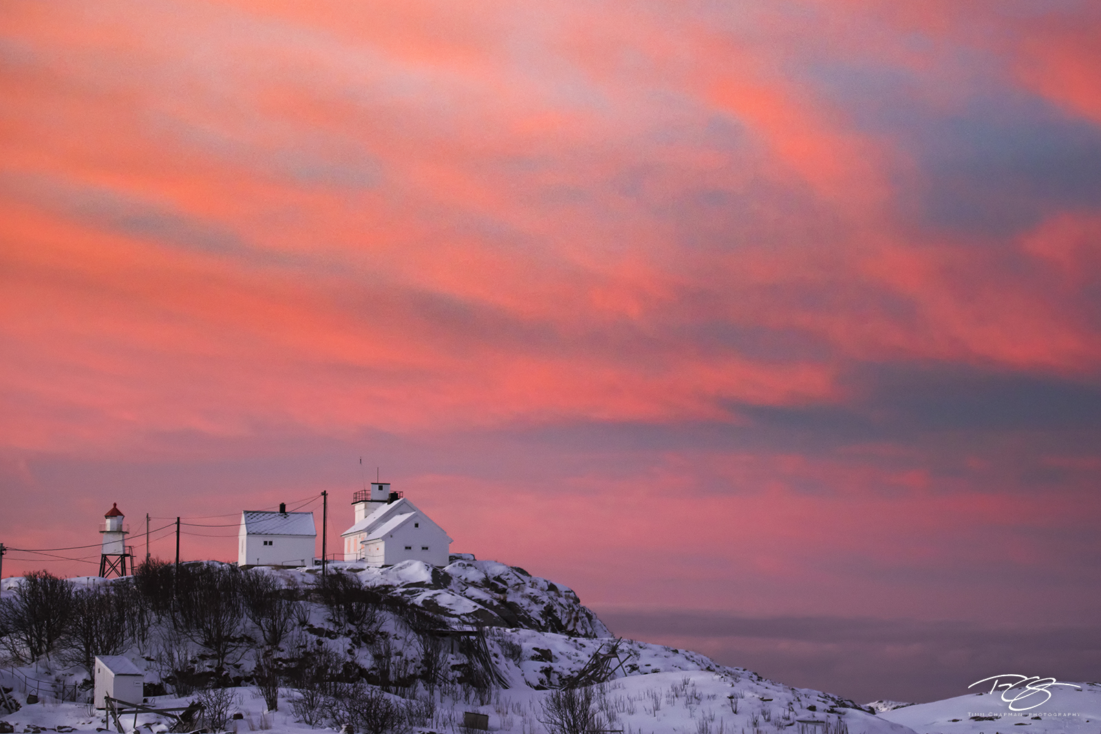 Fire in the Sky Pre dawn colour erupts in the winter sky above a lonely lighthouse. Red Sky in the Morning...Sailor's Warning