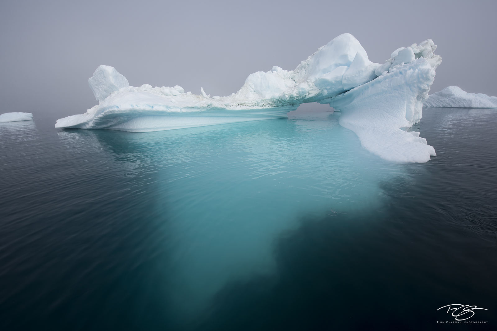 Ghost Berg A massive iceberg emerges from thick fog cloaking Greenland's Disko Bay
