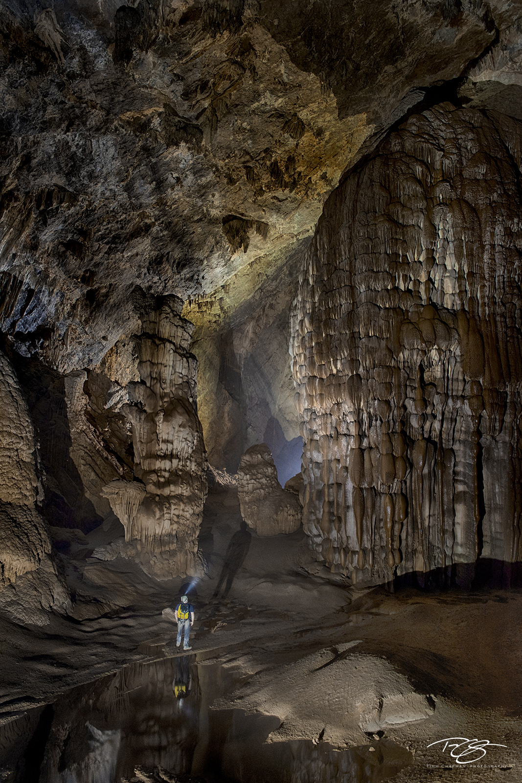 Rock of Ages A lone explorer is dwarfed by the immensity of stagmites formed over millennia inside Hang Son Ðoòng cave