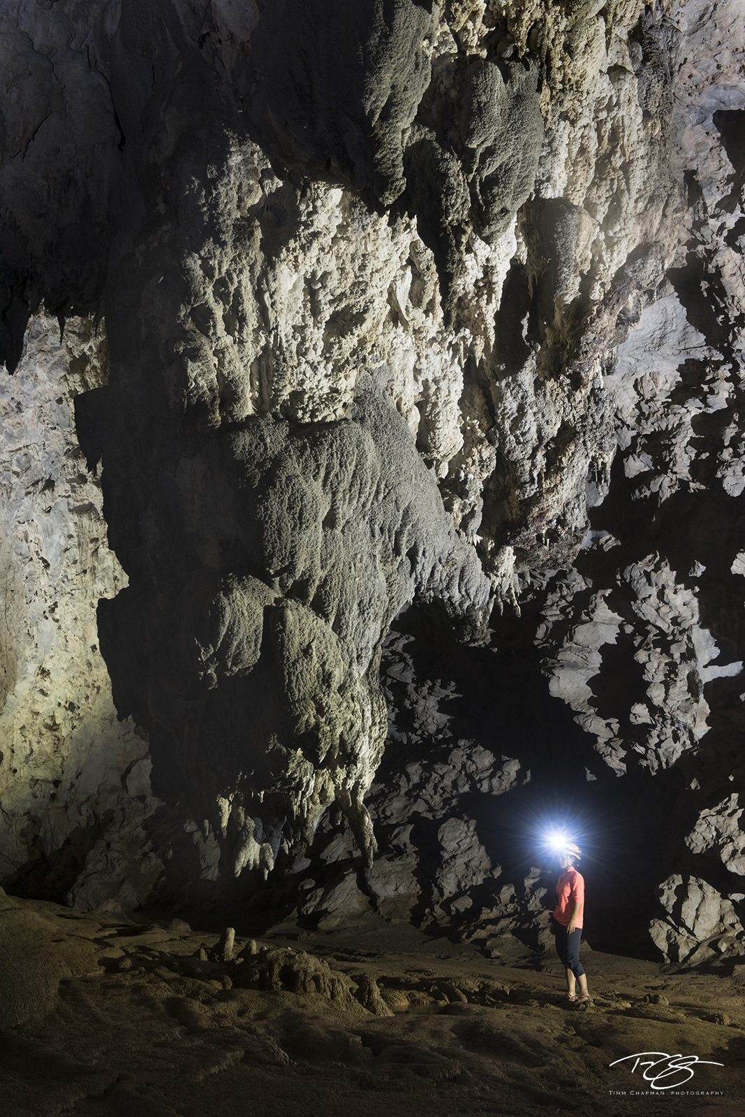 The Rockcicle A caver marvels at a giant stalactite