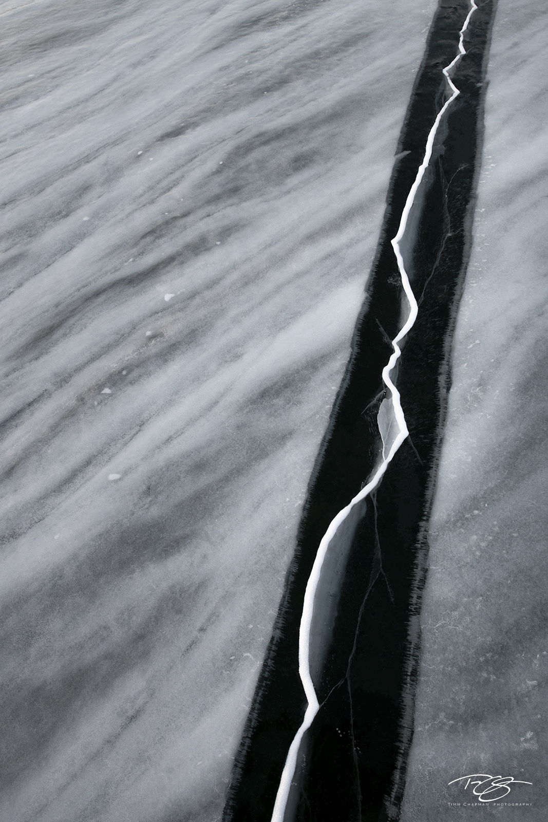 The Thoroughfare A crack separates two massive sections of ice in the Maloe Mare Strait, whilst a freshly frozen join attempts to seal...