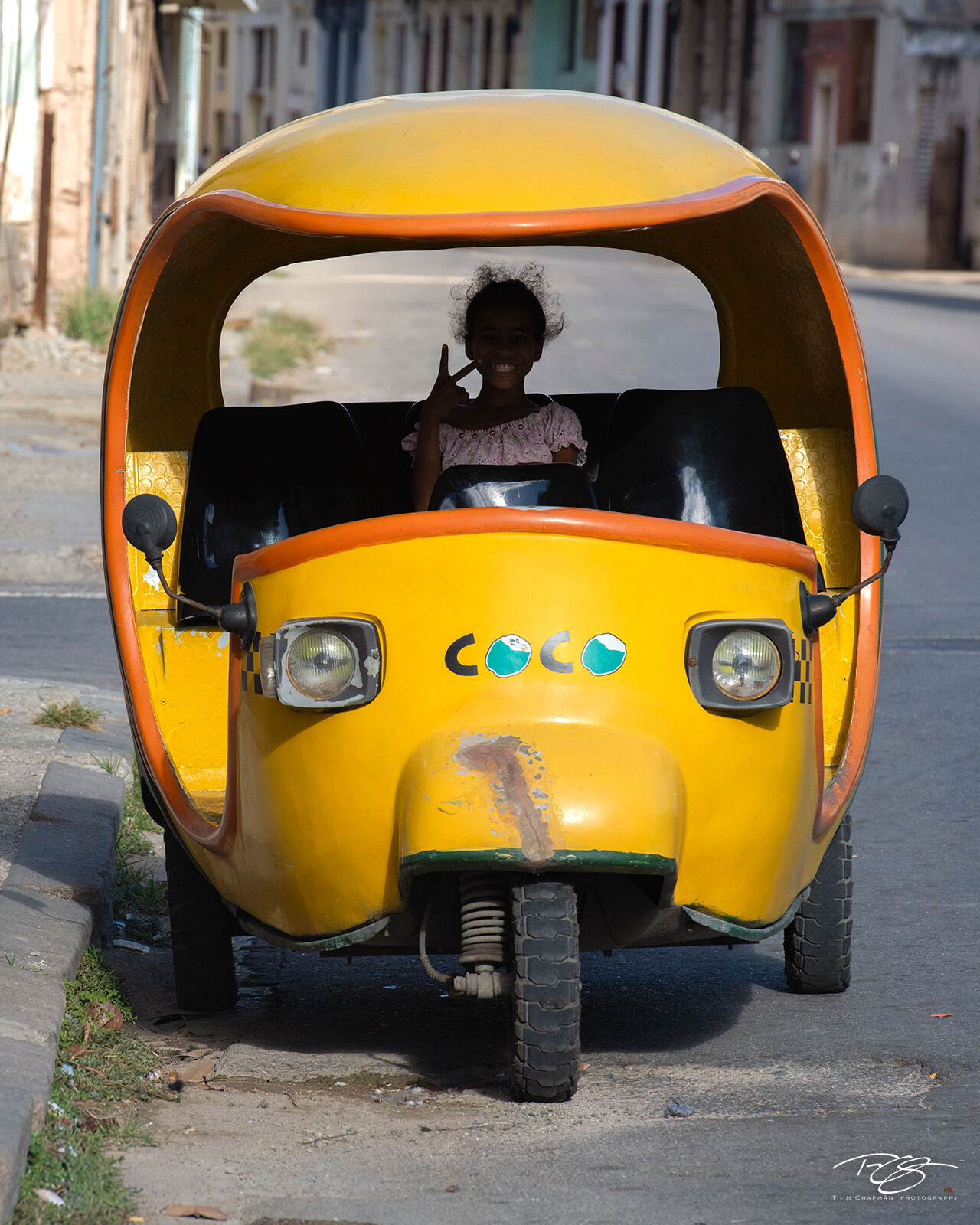 Trailblazer A young girl in a Coco Taxi offers a hair-raising ride along the streets of Central Havana